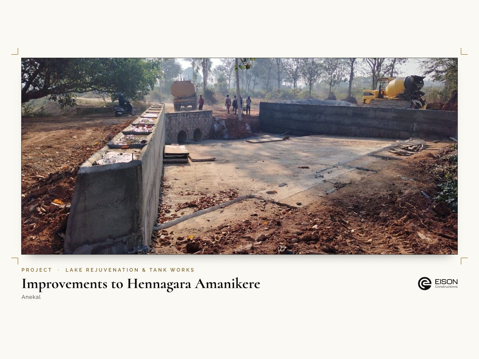 Improvements to Hennagara Amanikere, Anekal: concrete wall and culvert works under way